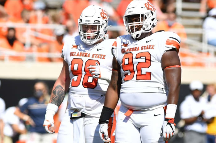 Brendon Evers (98) and Cameron Murray (92) get ready to line up earlier this season against West Virginia.